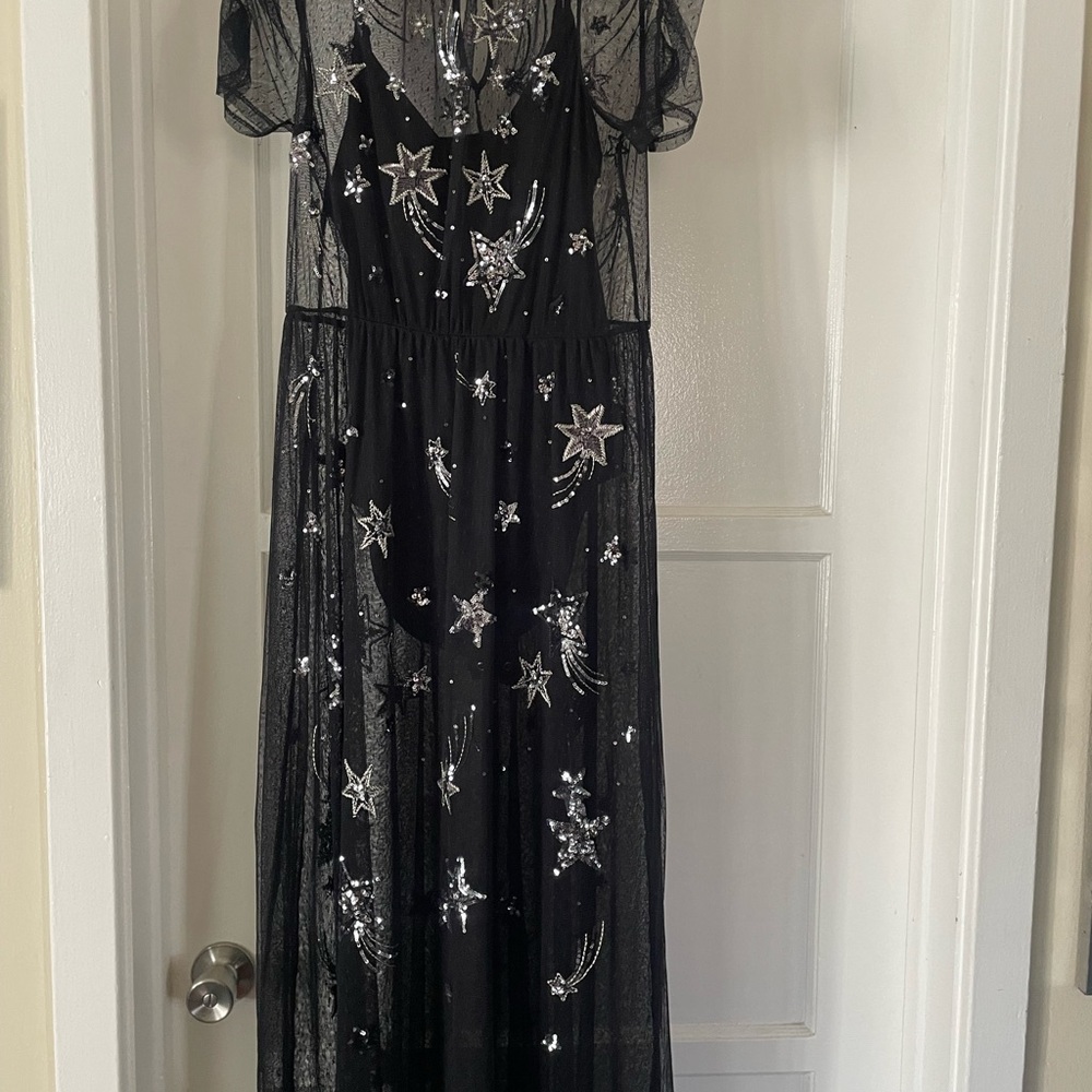 Black sequined puff sleeve dress